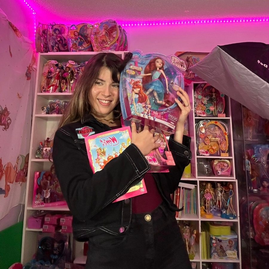 Deena with her Winx Club collection